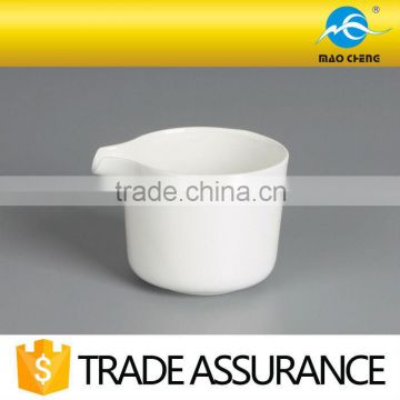 delicate white ceramic coffee creamer