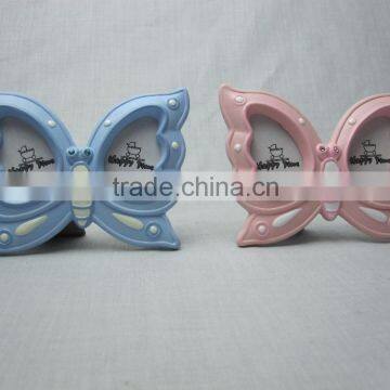 Ceramic middle size butterfly shaped double holes baby photo frames