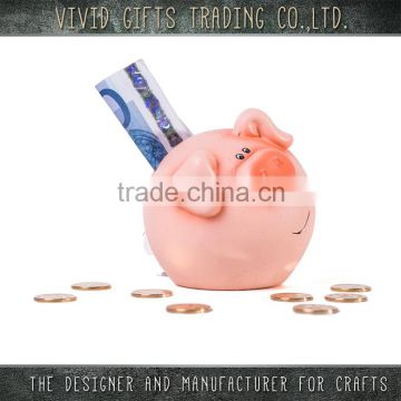 Ceramic or Porcelain New Year lucky pig money box for home decoration