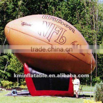 giant inflatable football on tee