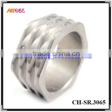 White stainless steel spiral ring with diamond inlay in each layer