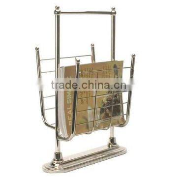 Golden colored chrome magazine display stand