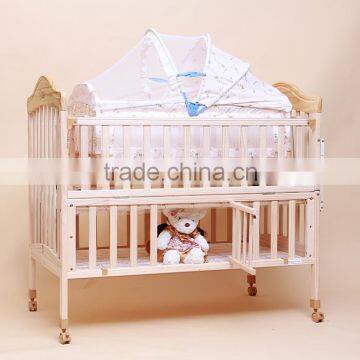 Wooden baby bed with mosquito net