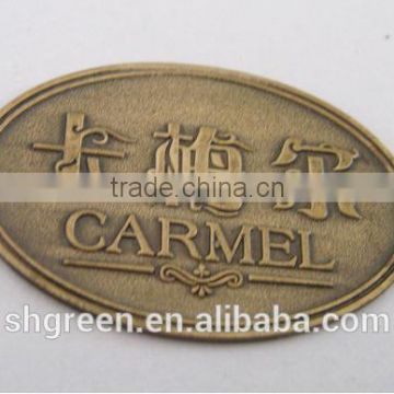 Gunmetal brass name badge with raised logo