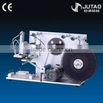 Adhesive small bottle labeling machine