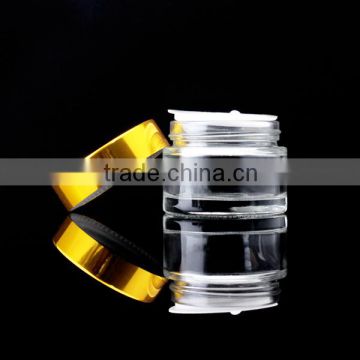 clear glass jar with shiny gold cap