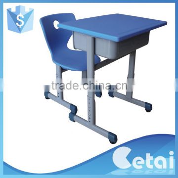 Adjustable plastic school desk and chair