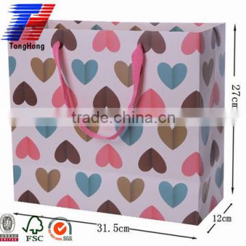 Heart pattern CMYK print paper bag for gift packaging with handles