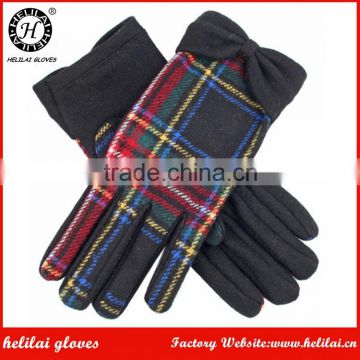 Women's tartan gloves with woollen bow detail at the cuff