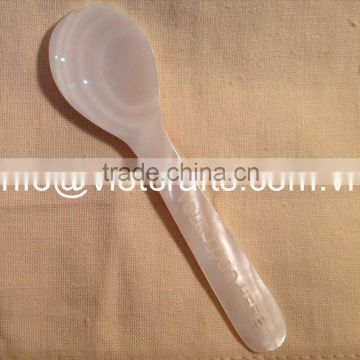 Mother of pearl spoon with laser engrave logo on the handle