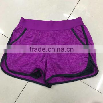 China garment stock lot factory price women cheap gym shorts