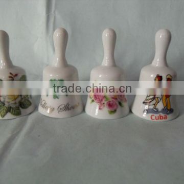 Porcelain souvenir bell with flower design