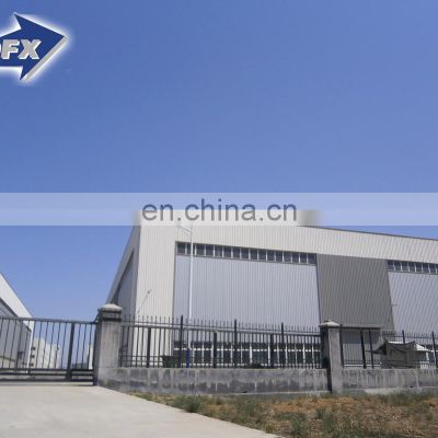 China prefabricated honeycomb column plane roof steel frame workshop with crane