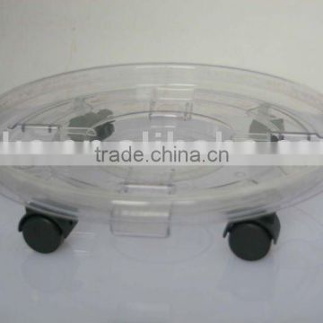 Transparent plastic plant pot saucer with wheels
