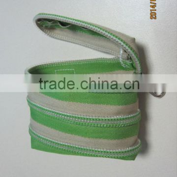 Promotional clasp for coin purse