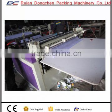 Computer Non woven roll embossed - punched - sheets cutting machine