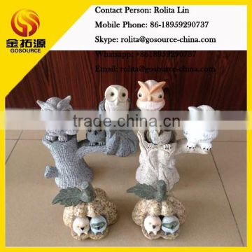 mini stone owl carving in nest