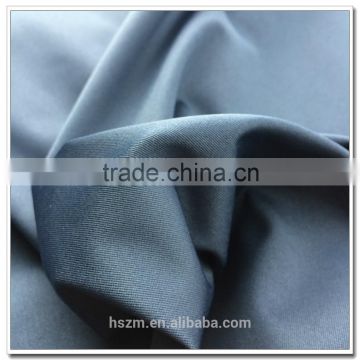 Polyester twilled satin fabric for trench coat / jacket