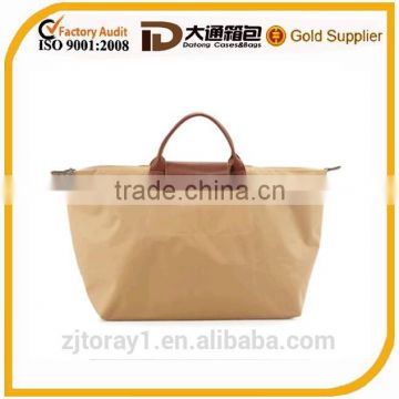 leather handles jute tote bag in shopping bag