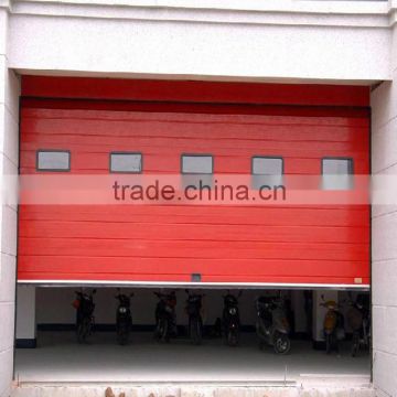 High vertical lift solid structure electrical control overhead sectional door