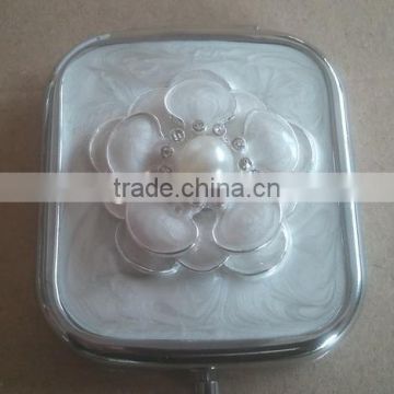 small decorative rectangular compact mirror with flower decor