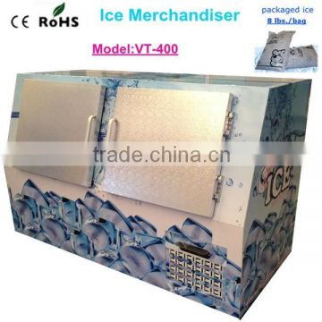 Upright ice merchandiser with fan cooling system