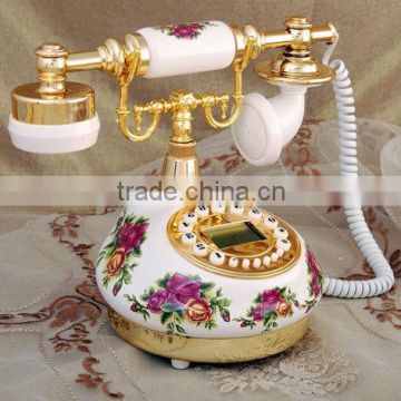 old model telephones with carved flower