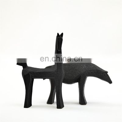 small simple abstract art minimalist room table animal sculpture