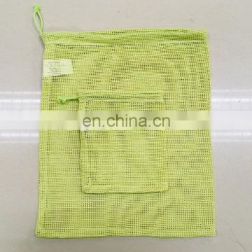 Reusable dyed green cotton net storage bags for food and veggie