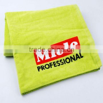 Yellow personalised gym towels embroidered printed logo
