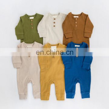 Long sleeved solid color knitted cotton baby jumpsuit romper