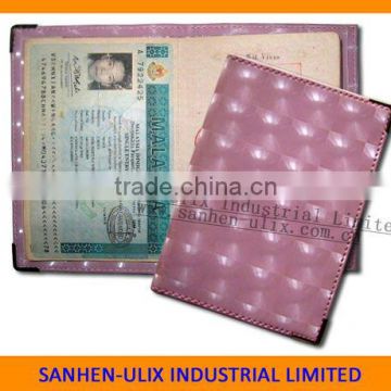 Passport holder with metal horn, available in various colors