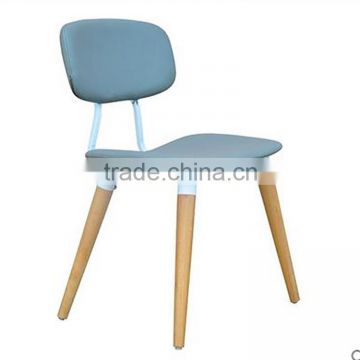 blue fabric upholstered dining room chair with leather