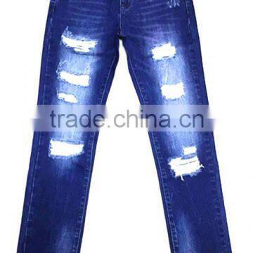 lady's ripped denim blue scratched jeans pants