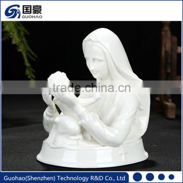 Mary mother of baby jesus statue