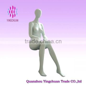 Fashion display egg head siiting female mannequin