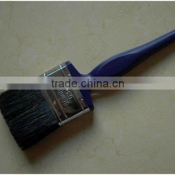 blue plastic handle brush