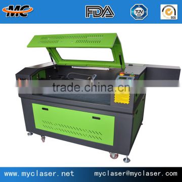 Paper plastic plates CO2 CNC laser cutting engarving machine MC9060