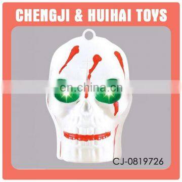 2015 new plastic halloween skull head pendant toy with light and music