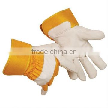 Cow grain leather 2.natural color 3.index finger wrapper 4.yellow cotton backrubberized cuff 5.size:10" /best quality by taidoc