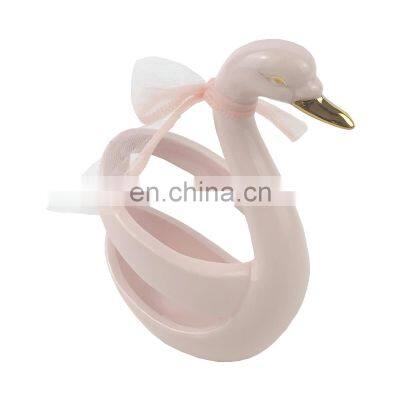 pink swan shaped ceramic fork holder stand