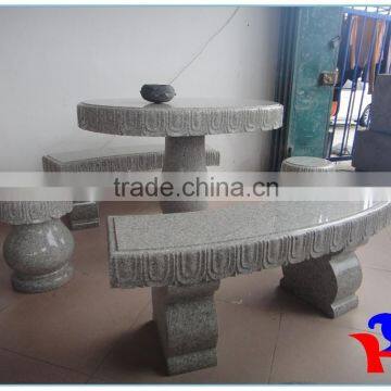 Stone table & chair used in garden