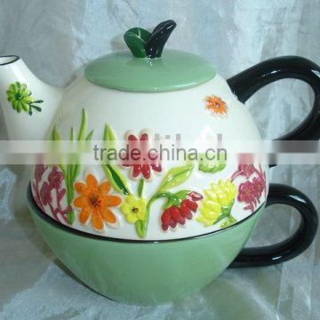 ceramic teapot hand painted and embossed