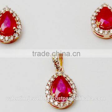 Daily Wear Pear Cut Ruby And Surrounding Diamonds Pendant And Earrings Set