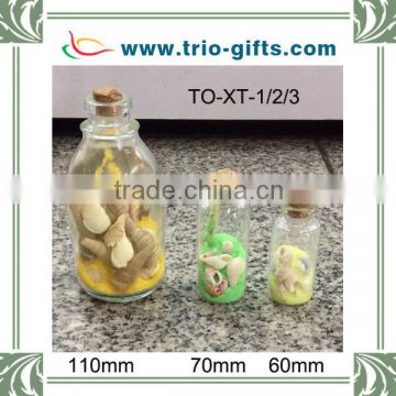 Glass bottle load sand and shell