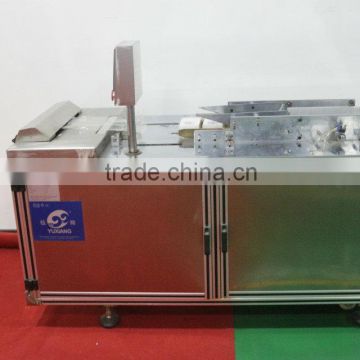 Full automatic shrink film wrapping machine