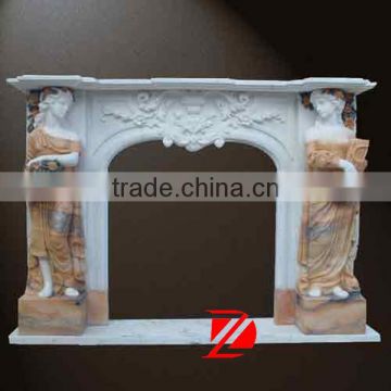 craved stone indoor fireplace with statue