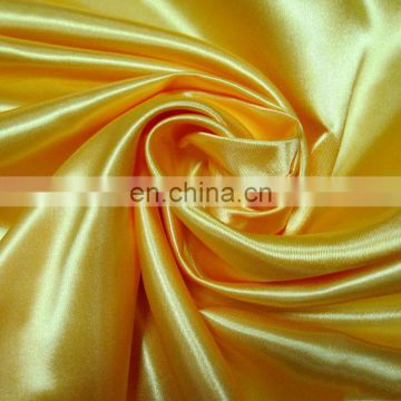 50*75D 100% polyester colorful stock cheap shiny satin fabric