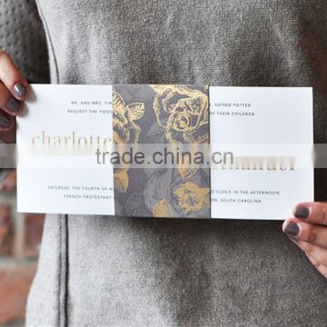 Luxurious gray wedding invitations featured a romantic floral pattern with metallic ink highlights