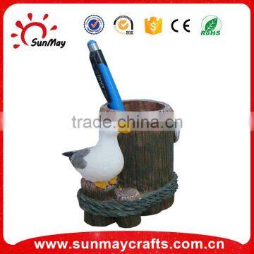 Polyresin pen holder with white bird statue